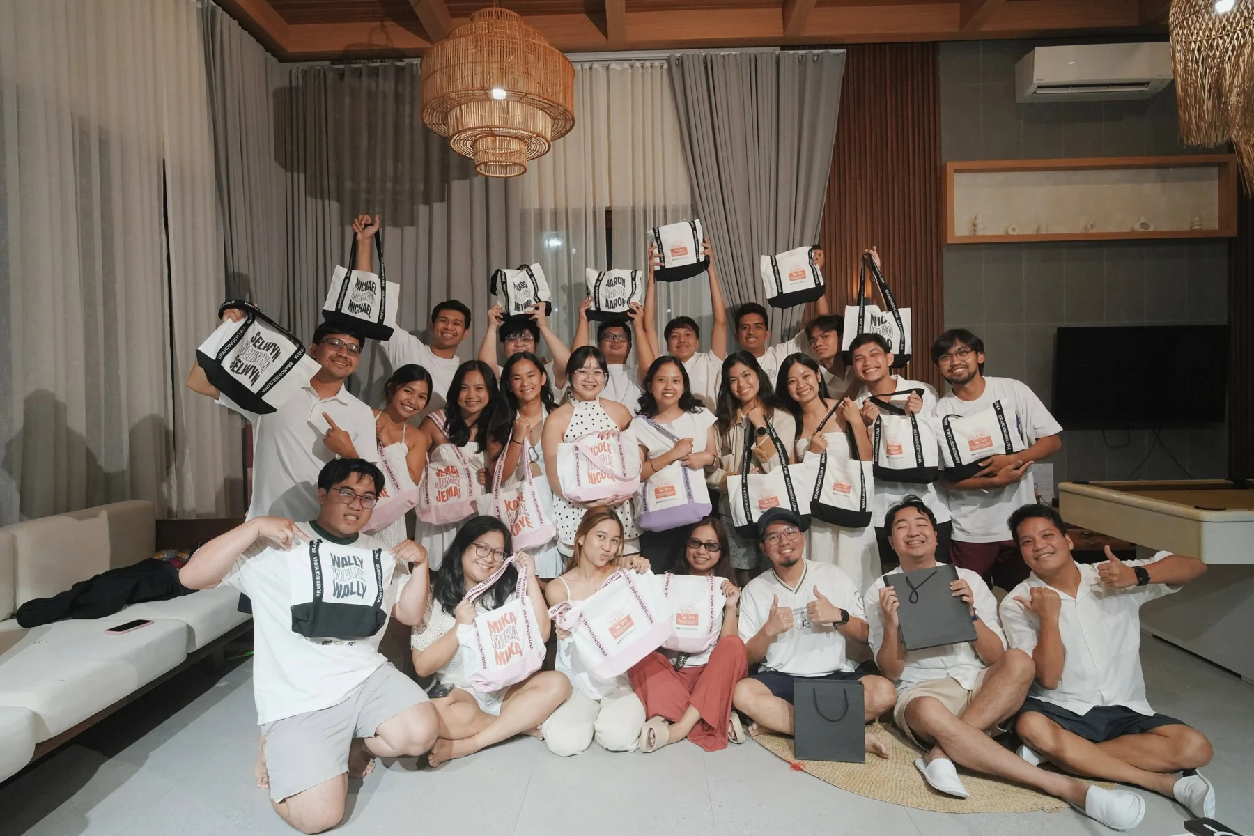 Team members holding recognition certificates