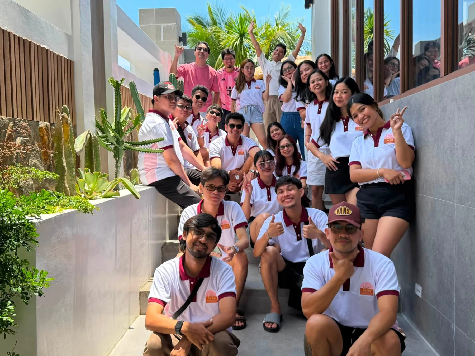 The team gathered on an outdoor staircase